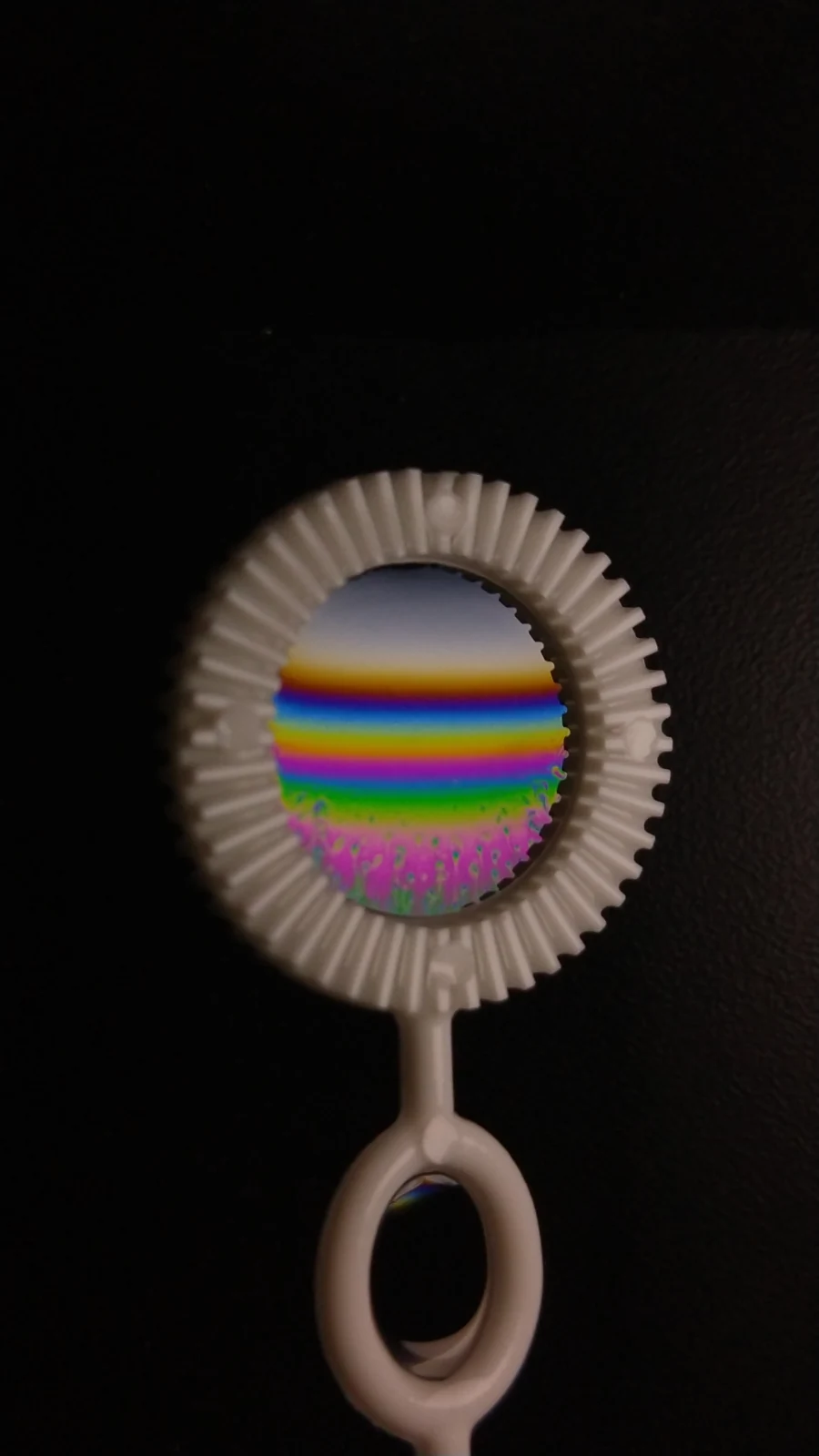 Soap film with colored interference bands